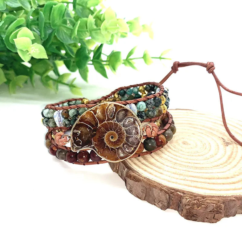 Natural stone bohemian conch bracelet in picture colour on a light background