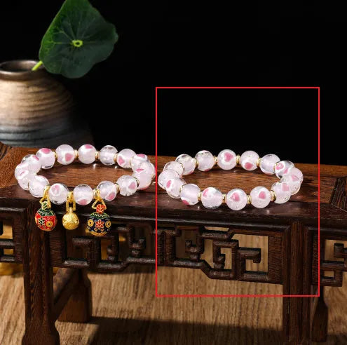 Handmade fluorescent glaze bracelet with swallowing gold beast motif on heart-shaped 10mm beads