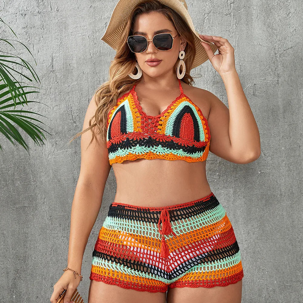 Blue women's plus size hollow out strap split swimsuit briefs on a white background.