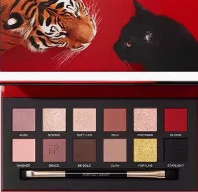 Explorer animal themed eye shadow palette with twelve shades showing cat tiger leopard designs