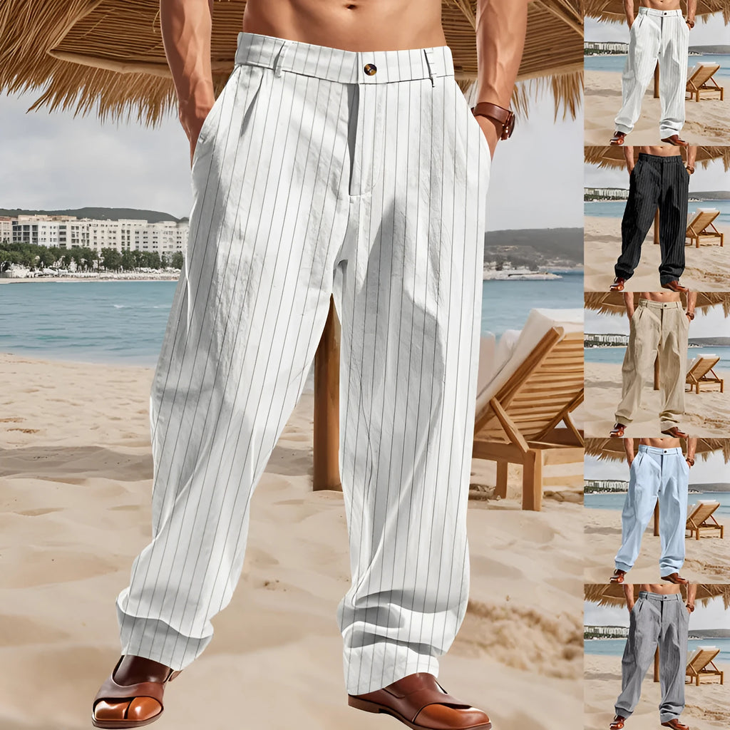 Man wearing beige striped linen trousers with a high waist and wide loose legs.