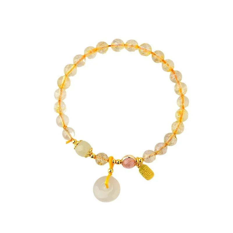 Gold rutilated quartz crystal bracelet with safety buckle and geometric pendant