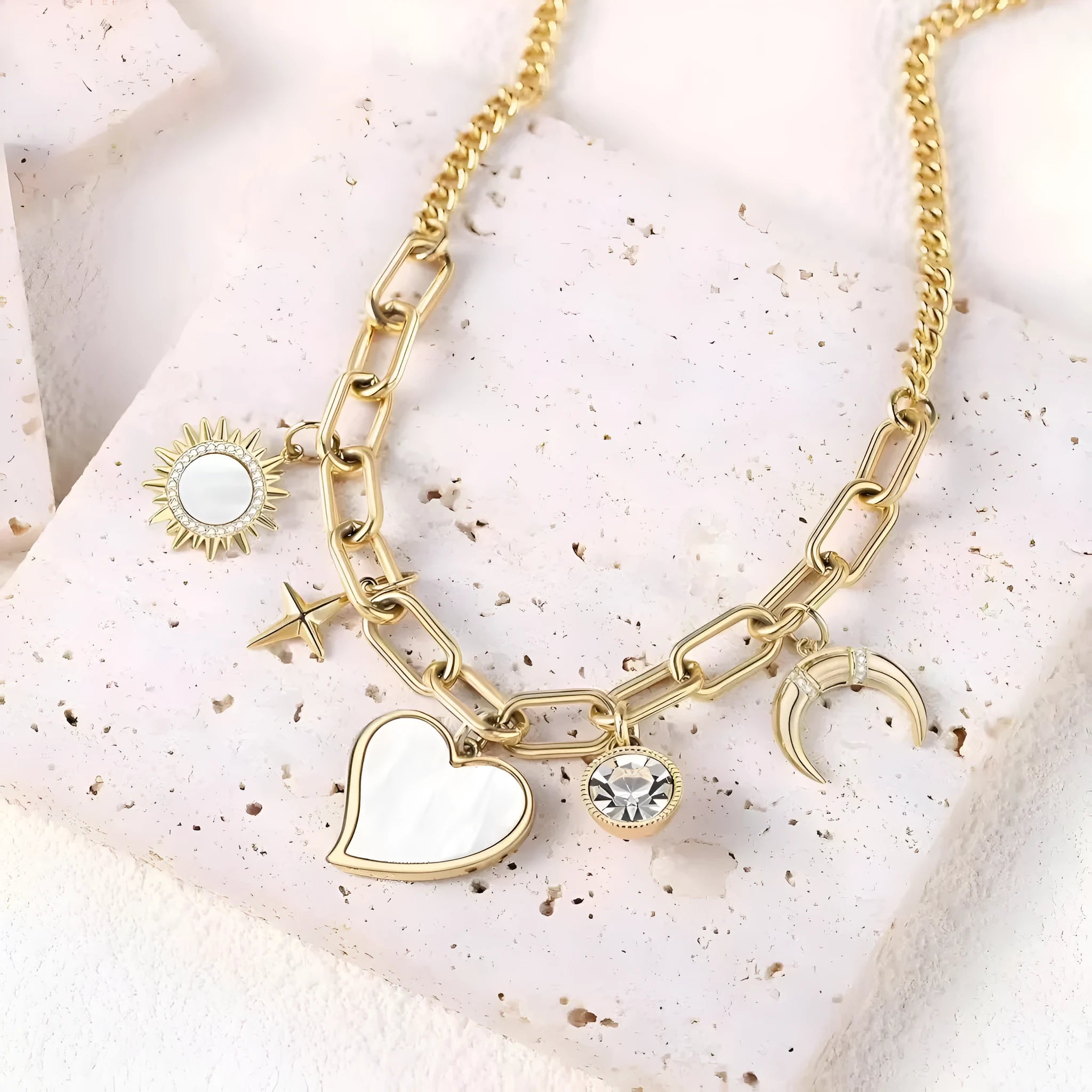Gold alloy pendant necklace with moon inlaid heart-shaped and star-shaped zircon on a bamboo chain
