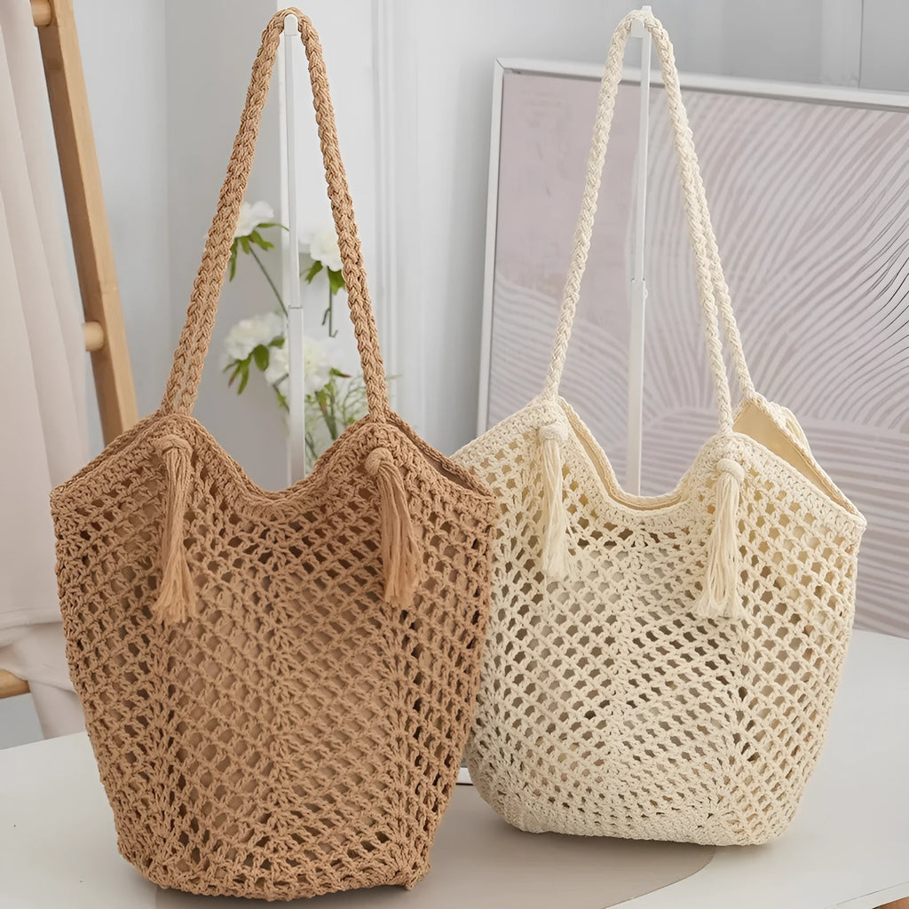 Handmade cotton thread woven hollow shoulder bag with tassel in creamy-white, vertical square shape, open pocket