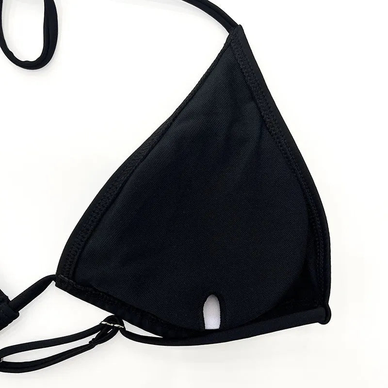 Black mesh women's four-piece bikini set with long sleeves for swimming