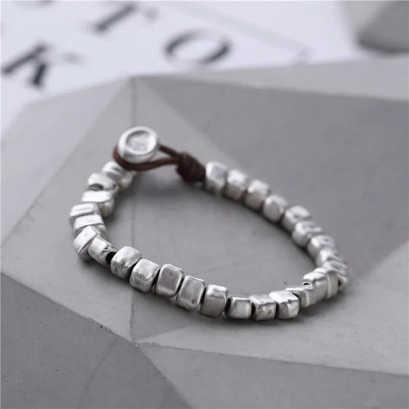 Handmade wooden bracelet with irregular silver square charm on elastic band