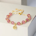Strawberry quartz crystal bracelet with geometric shapes and fu charm for women