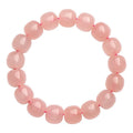 Pink barrel-shaped crystal bead bracelet with geometric 8-10mm beads