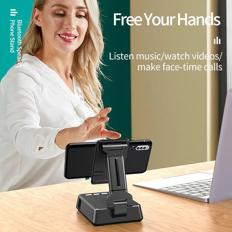 Black Bluetooth speaker phone stand with microphone for live streaming, showing phone holder and charging port