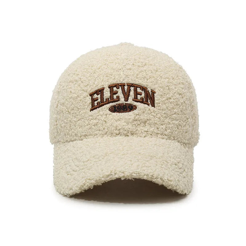 Adjustable winter baseball cap in thickened polyester lambskin fabric shown in multiple colour options