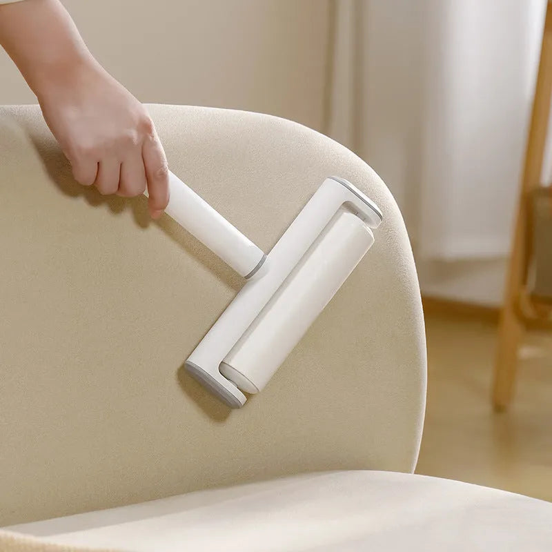 Refillable lint remover roller for picking up cat hair from floors and carpets
