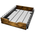 Black household storage rack with a pull basket drawer, made from wood and iron.