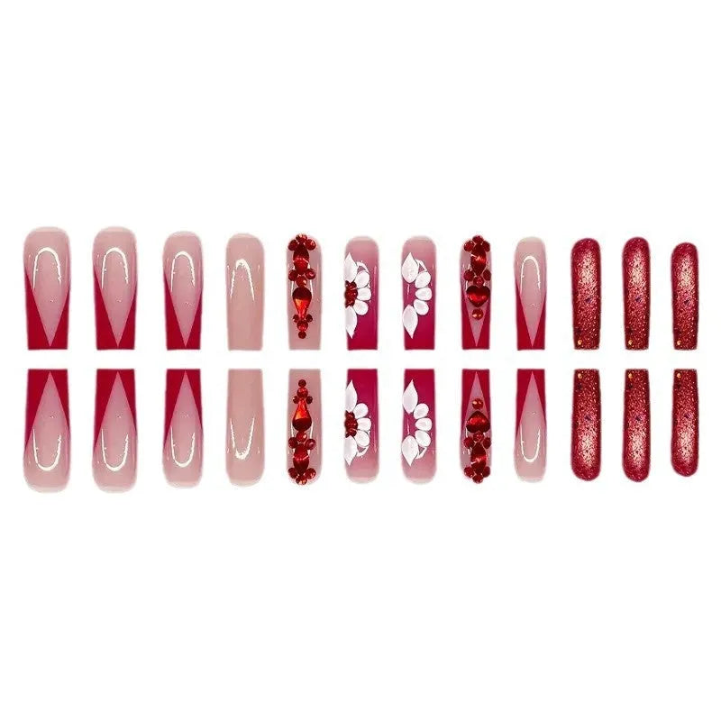 Sweet Flowers Temperament patterned press-on false nails with red diamond accents in a long square shape.