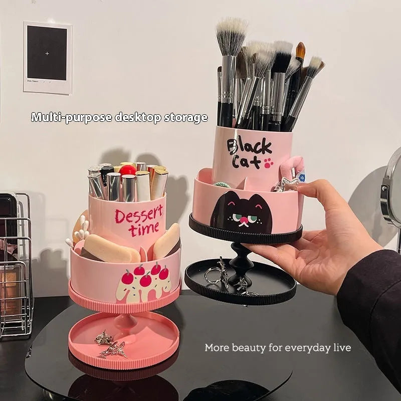 Rotating cosmetic brush storage barrel in a choice of colours on a table, showing its carousel design.