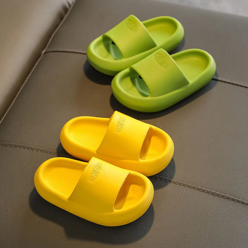 Mixed colour children's EVA slippers with a non-slip, wear-resistant sole, shown in multiple size options.