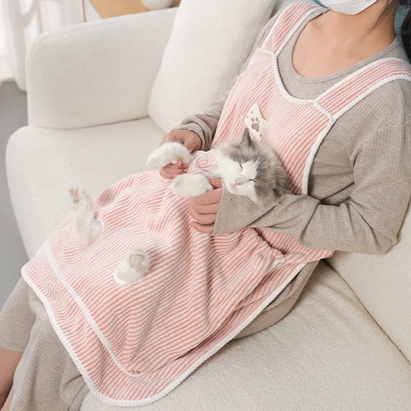 Cat petting apron in multiple colour options including pink, light blue, and striped patterns for grooming protection