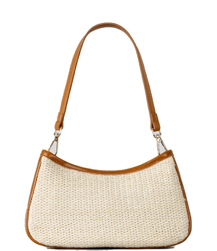 Khaki coloured hand-woven straw crossbody bag with a single strap and an internal phone pocket.