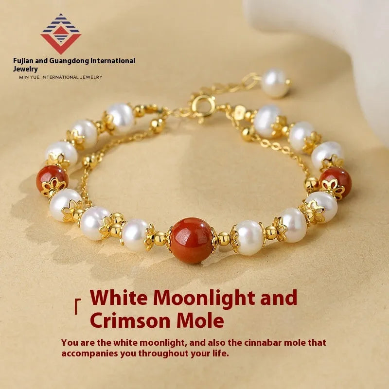 Sterling silver double-layer bracelet with red bean freshwater pearls and geometric bean charms in new Chinese style