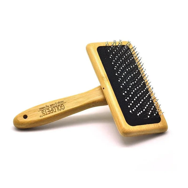 Goldpets bamboo slicker brush with wooden handle and stainless steel pins for grooming cats and dogs.