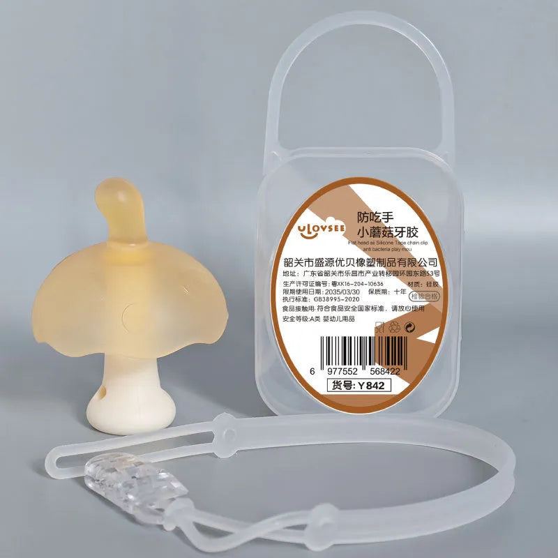 Small pink mushroom-shaped silicone chewy toy with a transparent chain and box.