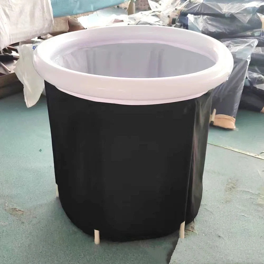 Black portable PVC ice bath with all-weather lid and included air pump accessories