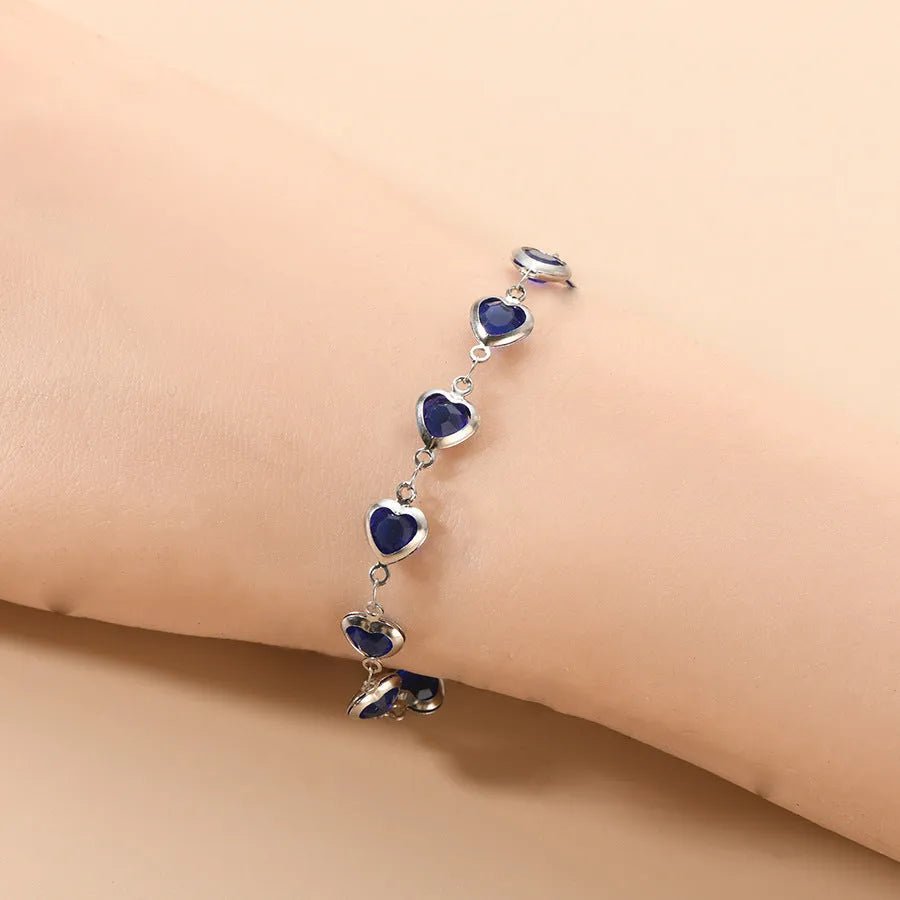 Unisex stainless steel geometry heart bracelet in a choice of six electroplated colours.