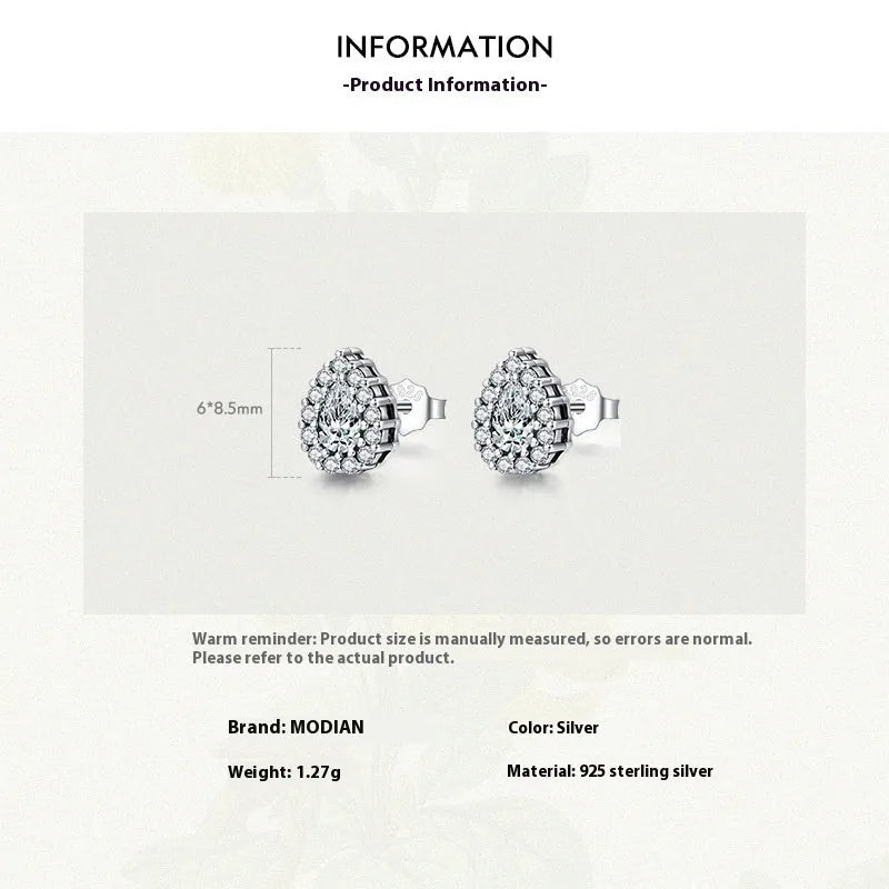 Women's silver water drop ear studs with diamond treatment and 925 sterling silver construction