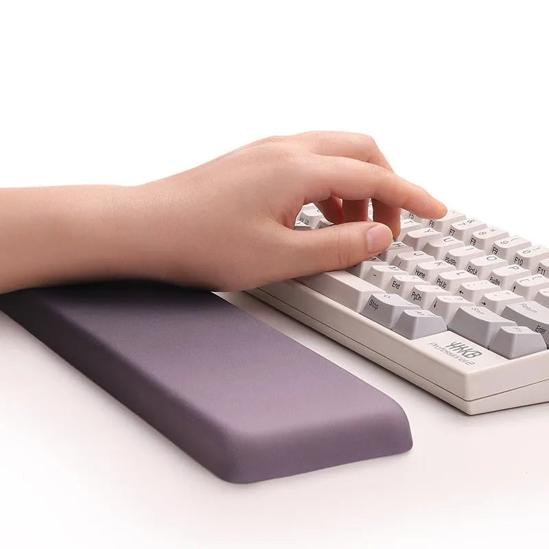 Square silica gel wrist rest mouse pad with cloth surface in colour options of black, blue, pink, or purple