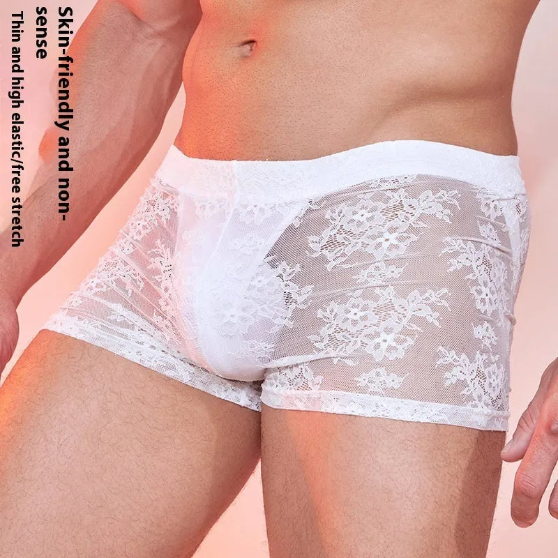 Lace detail men's nylon boxer shorts in black, shown on a white background.