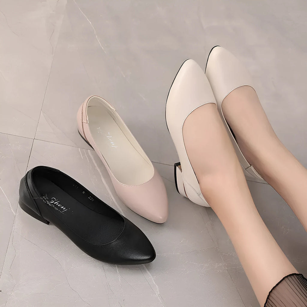 Beige women's pointed-toe flat shoes with a buckle, made from cowhide leather with a rubber sole.