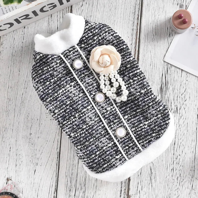 Black sausage jacket costume for cat on mannequin showing PU material and size tag