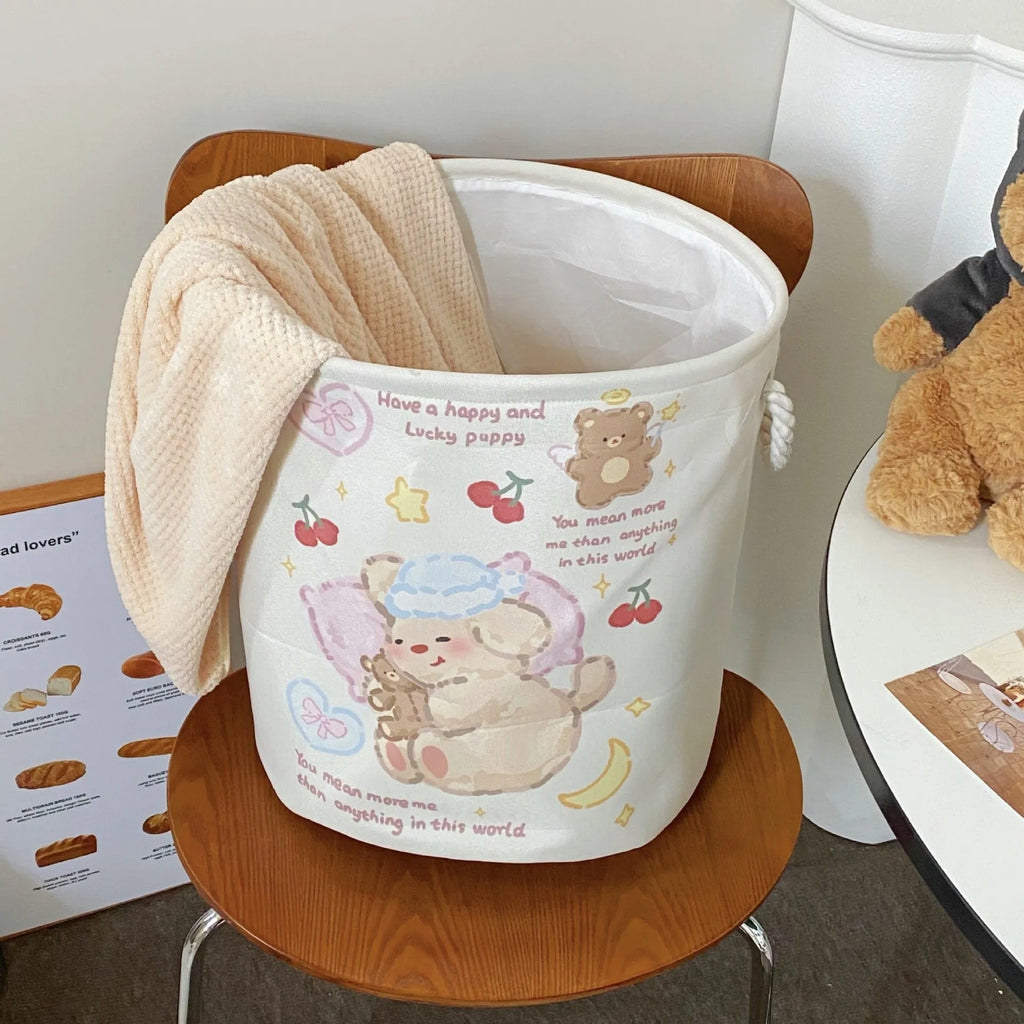 Foldable cotton cloth laundry basket in a choice of colours like puppy print or mint green.