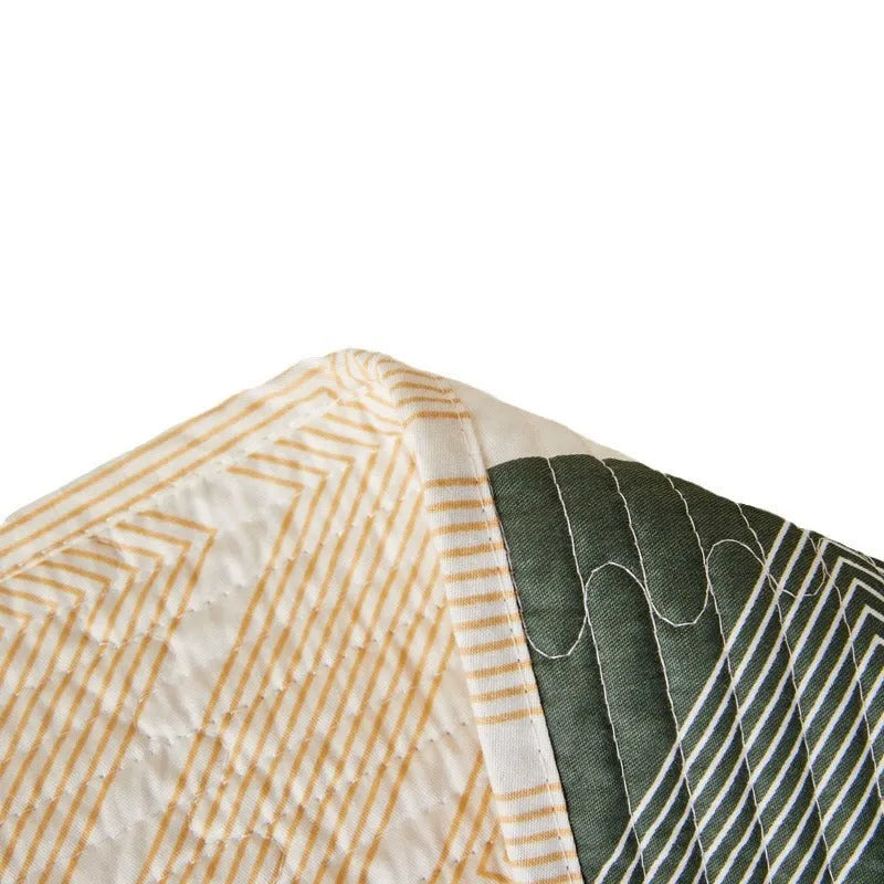 Pure cotton printed bed sheet set in a modern design on a bed, showing bedspread-style drape.