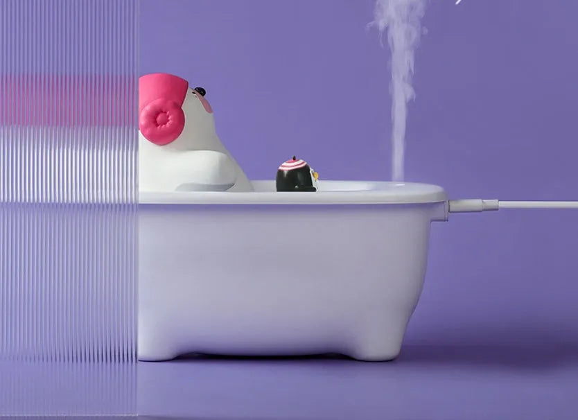 White USB-powered creative air humidifier with 550ml water tank on desk