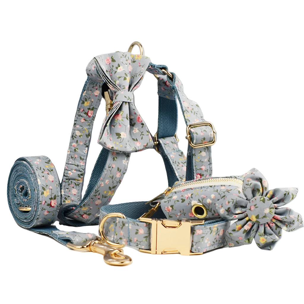 Blue floral dog accessory set with collar, leash, vest, bow tie and poop bag holder