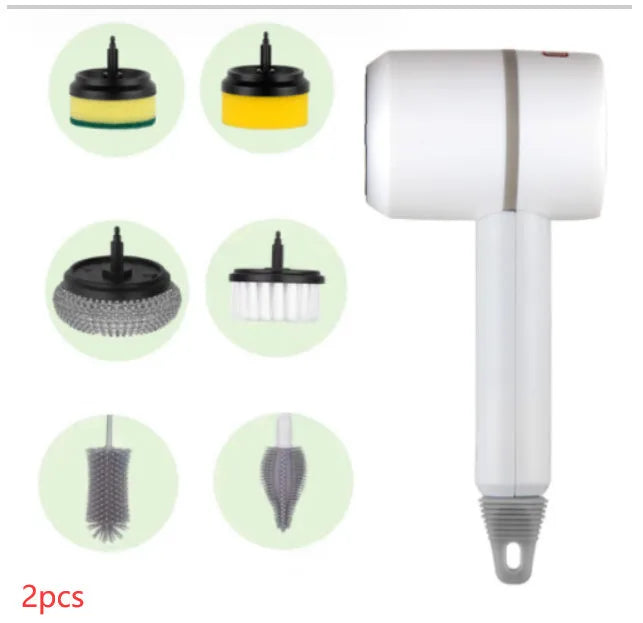White rechargeable electric cleaning brush with multiple scrubber heads on a kitchen worktop.