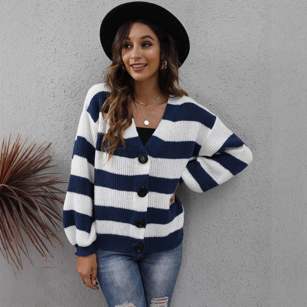 Women's striped deer plush cardigan with buttons in dark green, shown on a hanger.