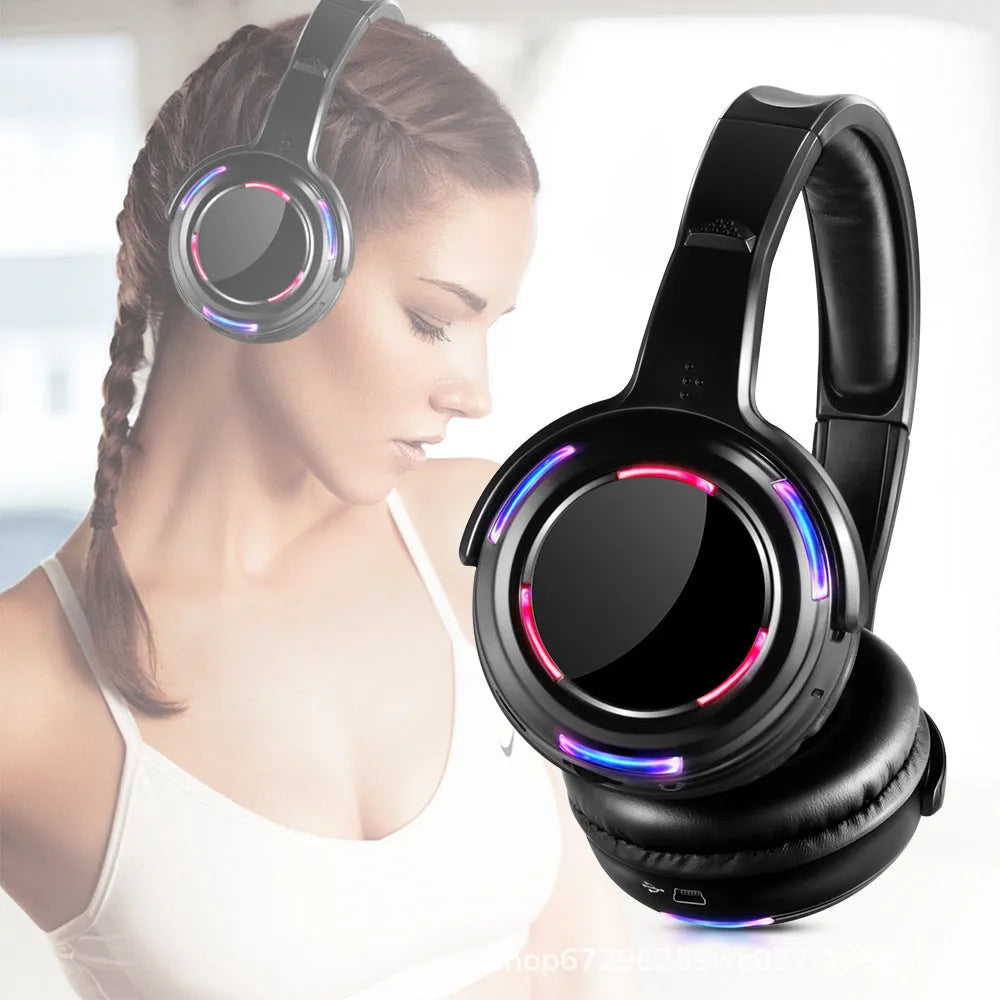 Black wireless silent disco headphones with LED light-up disco ball design on headset