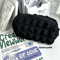Beige and black fabric pencil case with cream puff design for pen and pencil storage
