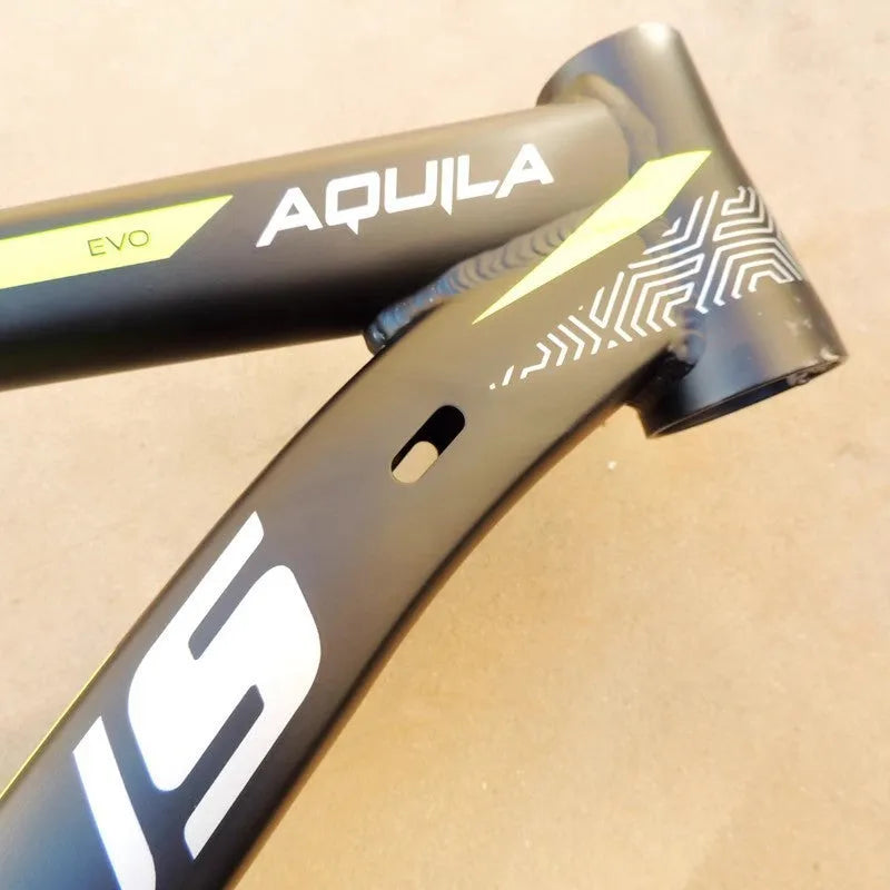 Black green aluminium mountain bike frame for 29-inch wheels with inner cable routing and disc brake mounts.