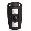 BMW semi-intelligent remote car key fob with three buttons, metal and plastic construction.