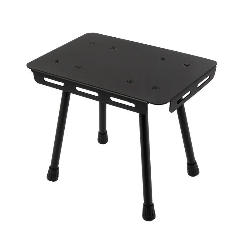 CLS aluminium dual-use camping stool shown in table mode with PU mat cushion, beside its storage bag.