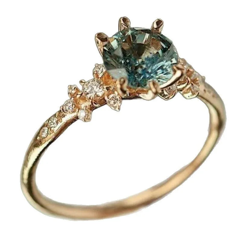 Geometric gold plated claw ring with square pattern and zircon detailing shown in unisex sizes 6-10