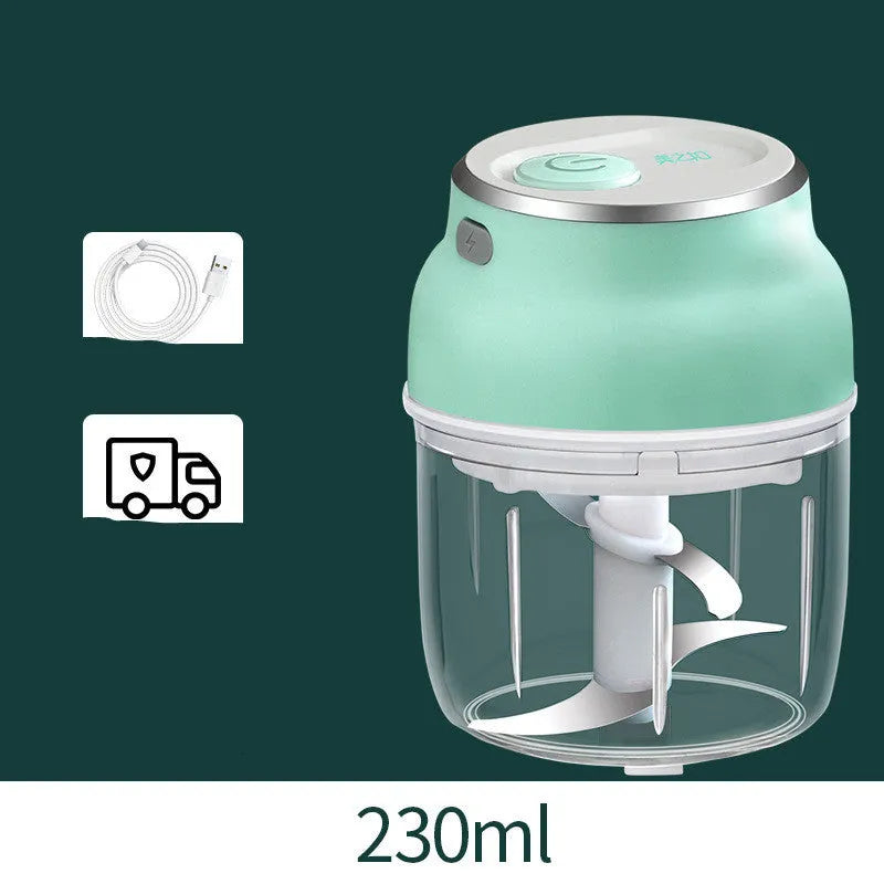 Green portable electric mini garlic cutter with transparent cup and USB charging cable