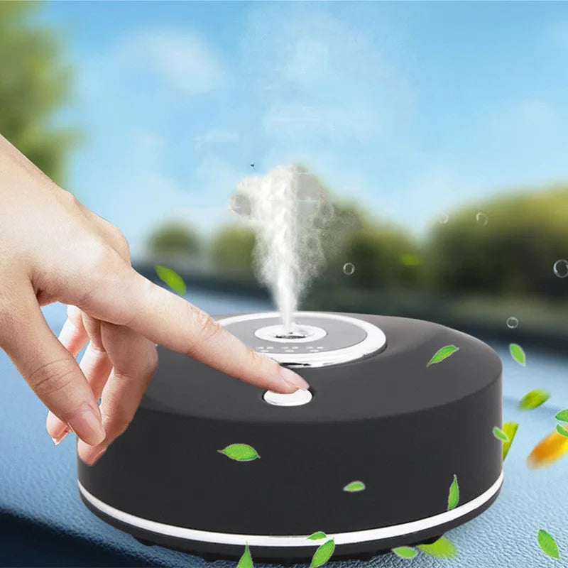 USB-powered plastic car fragrance diffuser in black, grey, or white with anti-slip pad and charging cable.