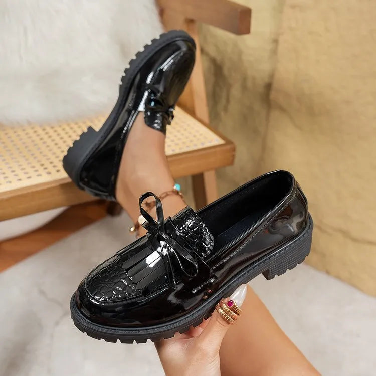Women's brown loafers with decorative bow on artificial PU upper, shown in UK size 39