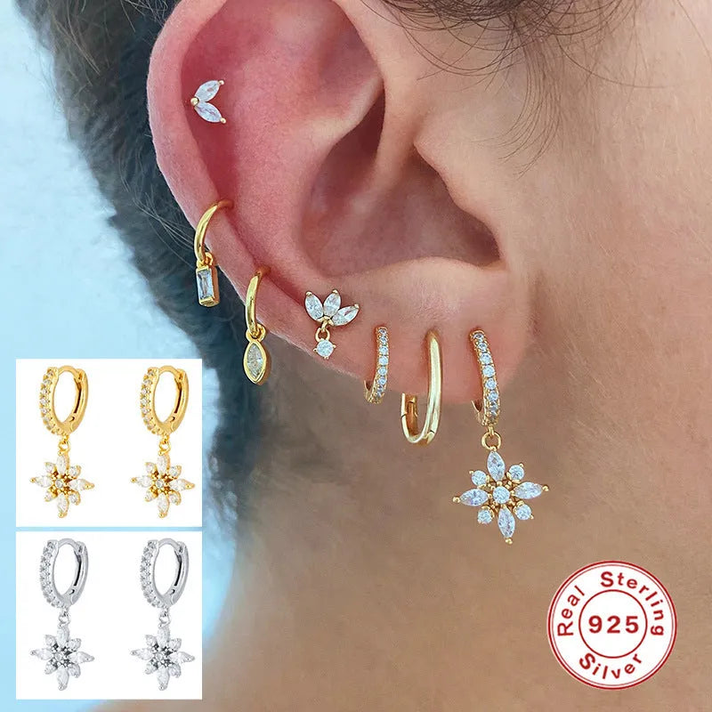 Sterling silver geometric snowflake earrings with diamond accents in yellow or white gold colour
