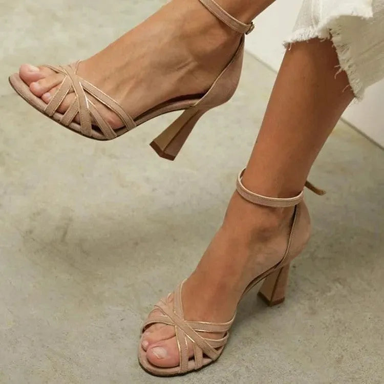 Apricot coloured suede peep toe women's sandals with distinctive bag heel design
