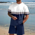 Man wearing a loose fit short-sleeved T-shirt and shorts suit in a solid colour for summer.
