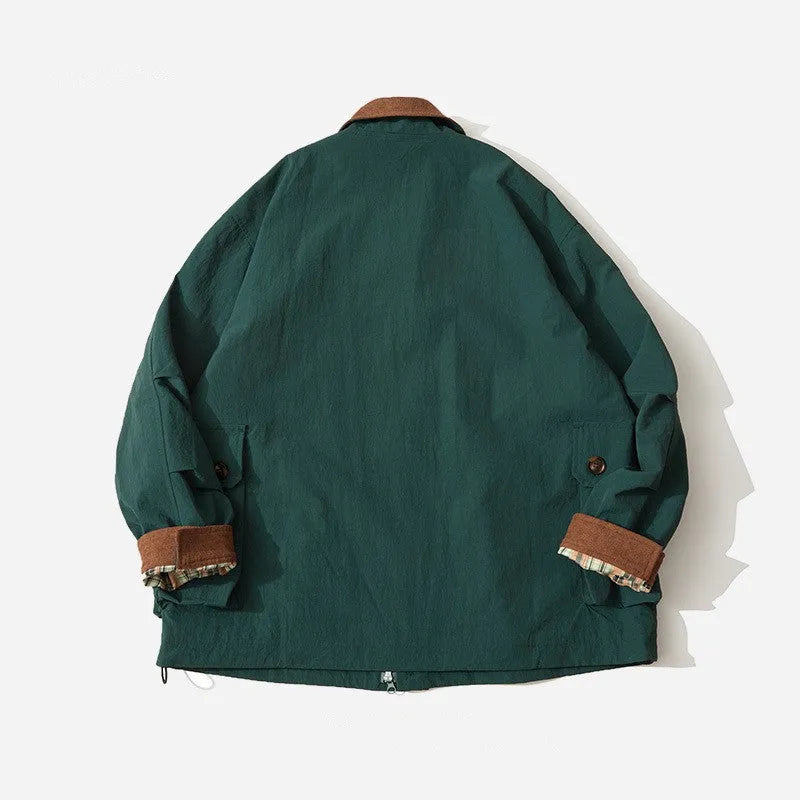 Green casual polyester jacket with side seam pockets on a hanger